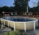 Atlas pool with white frame and wheat wall