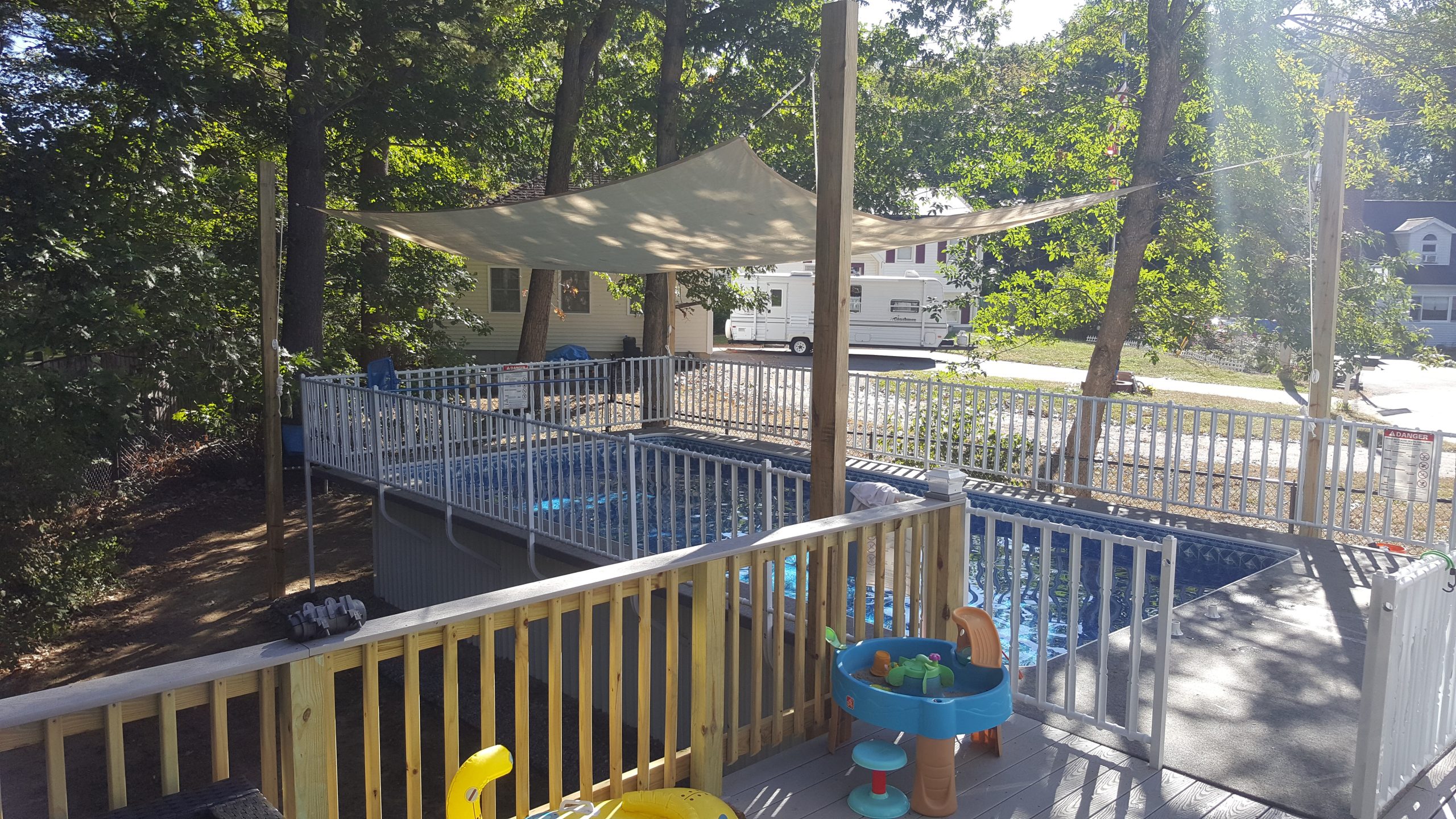 custom deck next to our above ground pool deck