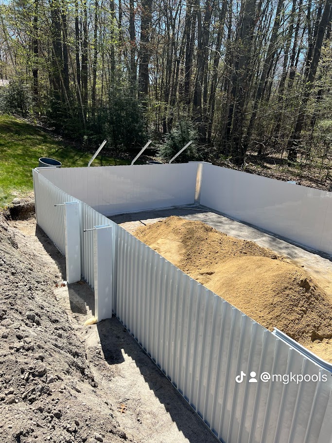 getting ready to add decks and level sand pool bottom