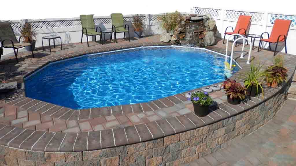 Semi-Inground-Pool-Gus-pools-NY - MGK Pools Inc hardscape around Aquasport 52