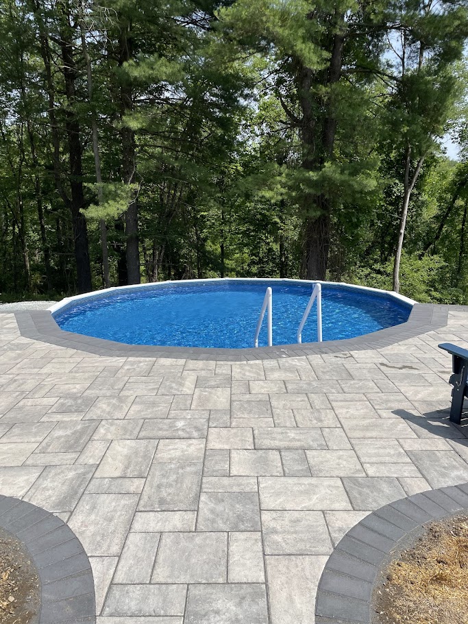 aquasport with great patio - MGK Pools Inc Customer submitted Aquasport 52 install