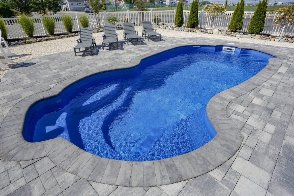 Merrimack Best - MGK Pools Inc Merrimack fiberglass pool installed - freeform shape with wraparound steps