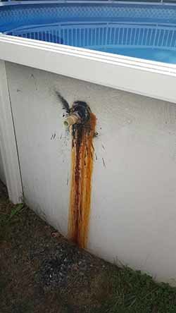 rusty steel wall return hole