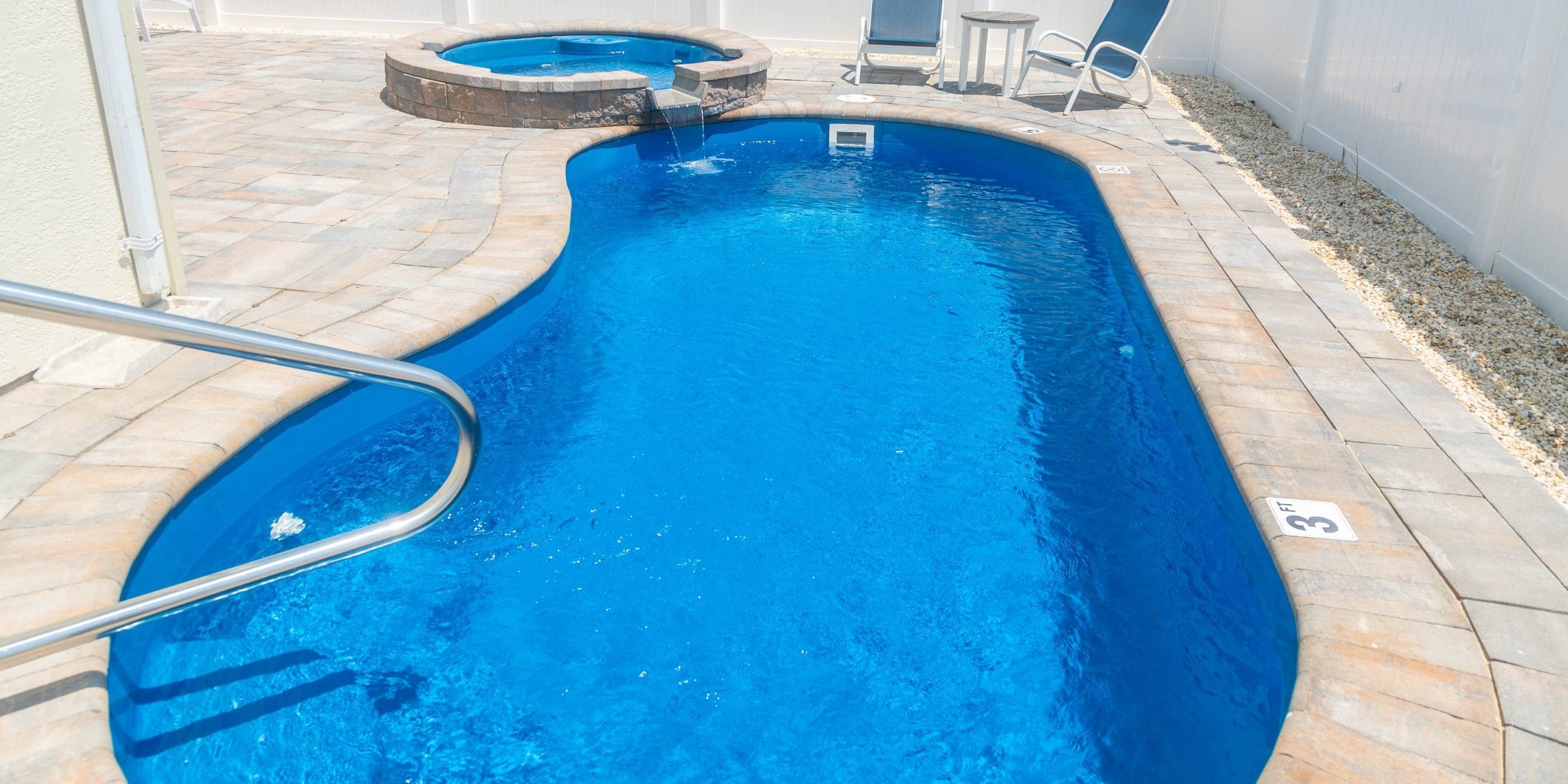 10x20-freeform-fiberglass-pool-rio-fiberglass-pool-install-2 - MGK Pools Inc Rio fiberglass pool by Glimmerglass - real installation photo, installed complete by MGK Pools