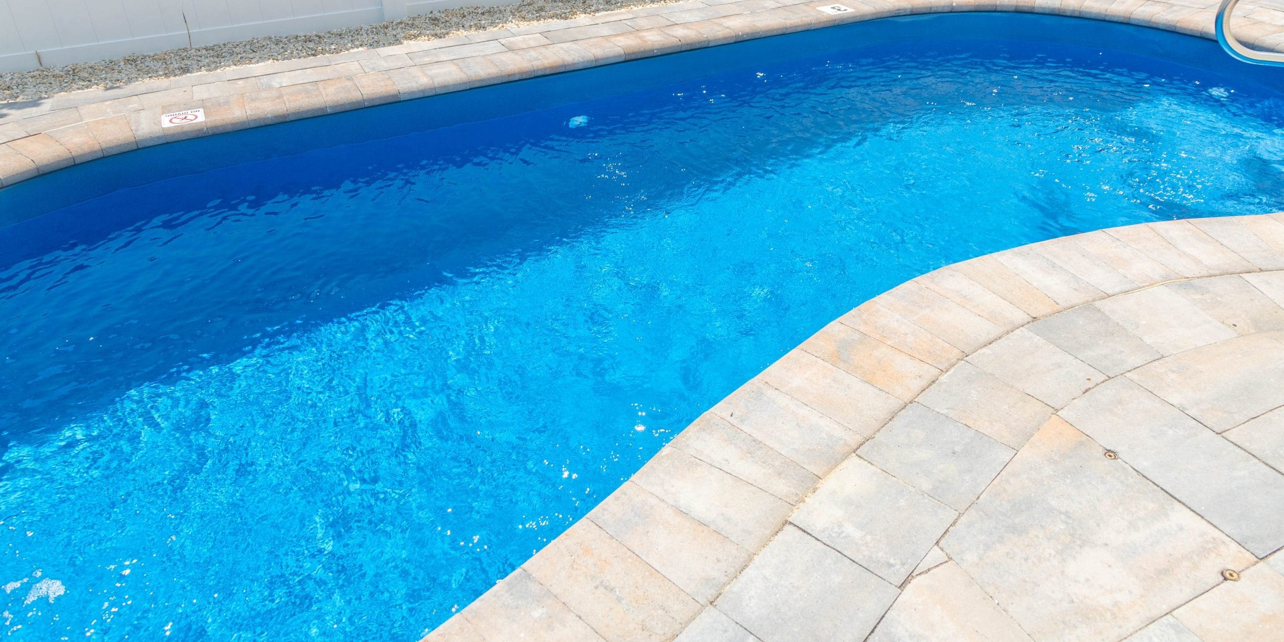 10x20-freeform-fiberglass-pool-rio-fiberglass-pool-install-3 - MGK Pools Inc Rio fiberglass pool by Glimmerglass - real installation photo, installed complete by MGK Pools