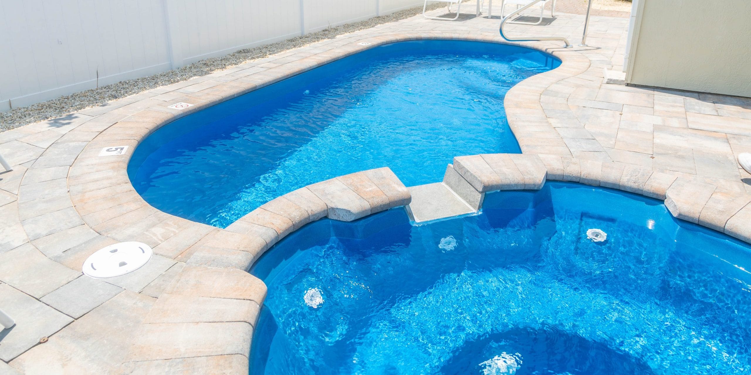 10x20-freeform-fiberglass-pool-rio-fiberglass-pool-install-4 - MGK Pools Inc Rio fiberglass pool by Glimmerglass - real installation photo, installed complete by MGK Pools