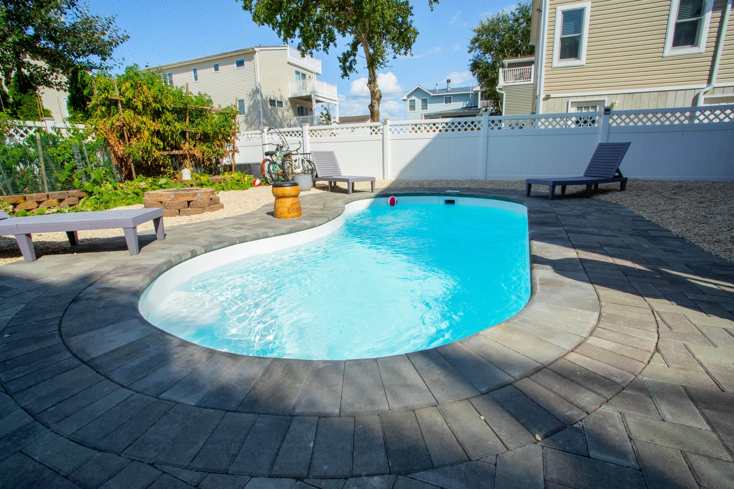 10x20-freeform-fiberglass-pool-rio-fiberglass-pool-install-5 - MGK Pools Inc Rio fiberglass pool by Glimmerglass - real installation photo, installed complete by MGK Pools