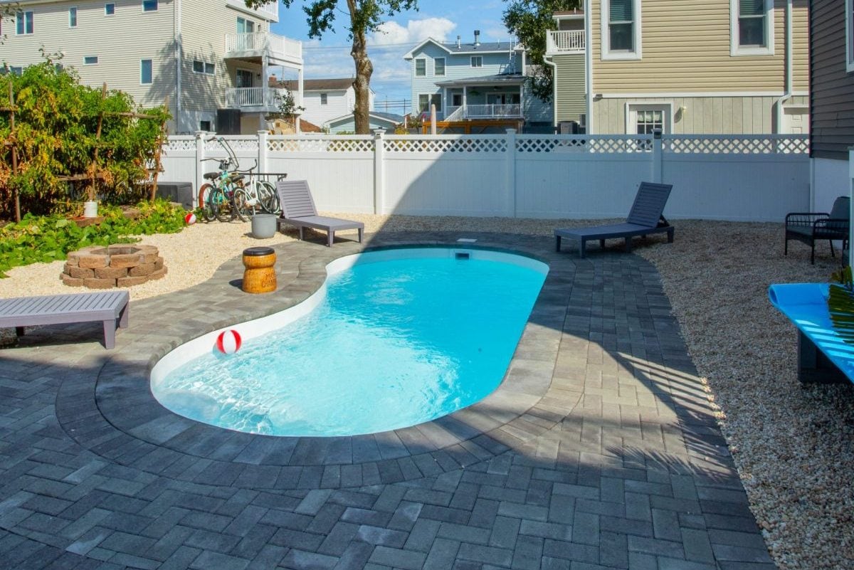 10x20-freeform-fiberglass-pool-rio-fiberglass-pool-install-6 - MGK Pools Inc Rio fiberglass pool by Glimmerglass - real installation photo, installed complete by MGK Pools