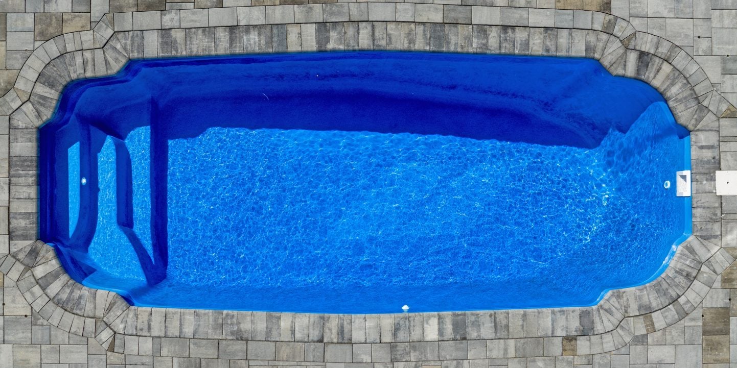 Quabbin fiberglass pool by MGK Pools - real installation photo, installed complete by MGK Pools