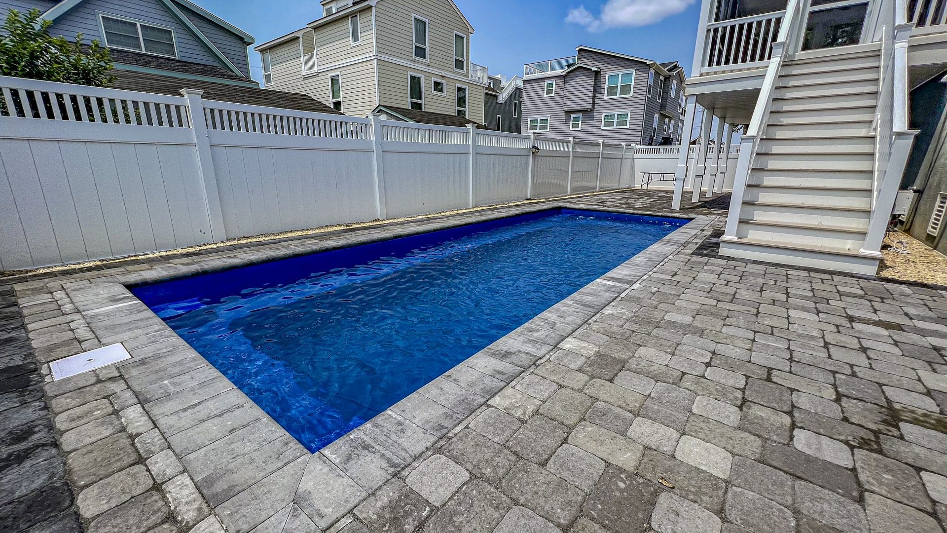 Swimmer fiberglass pool by MGK Pools - real installation photo, installed complete by MGK Pools