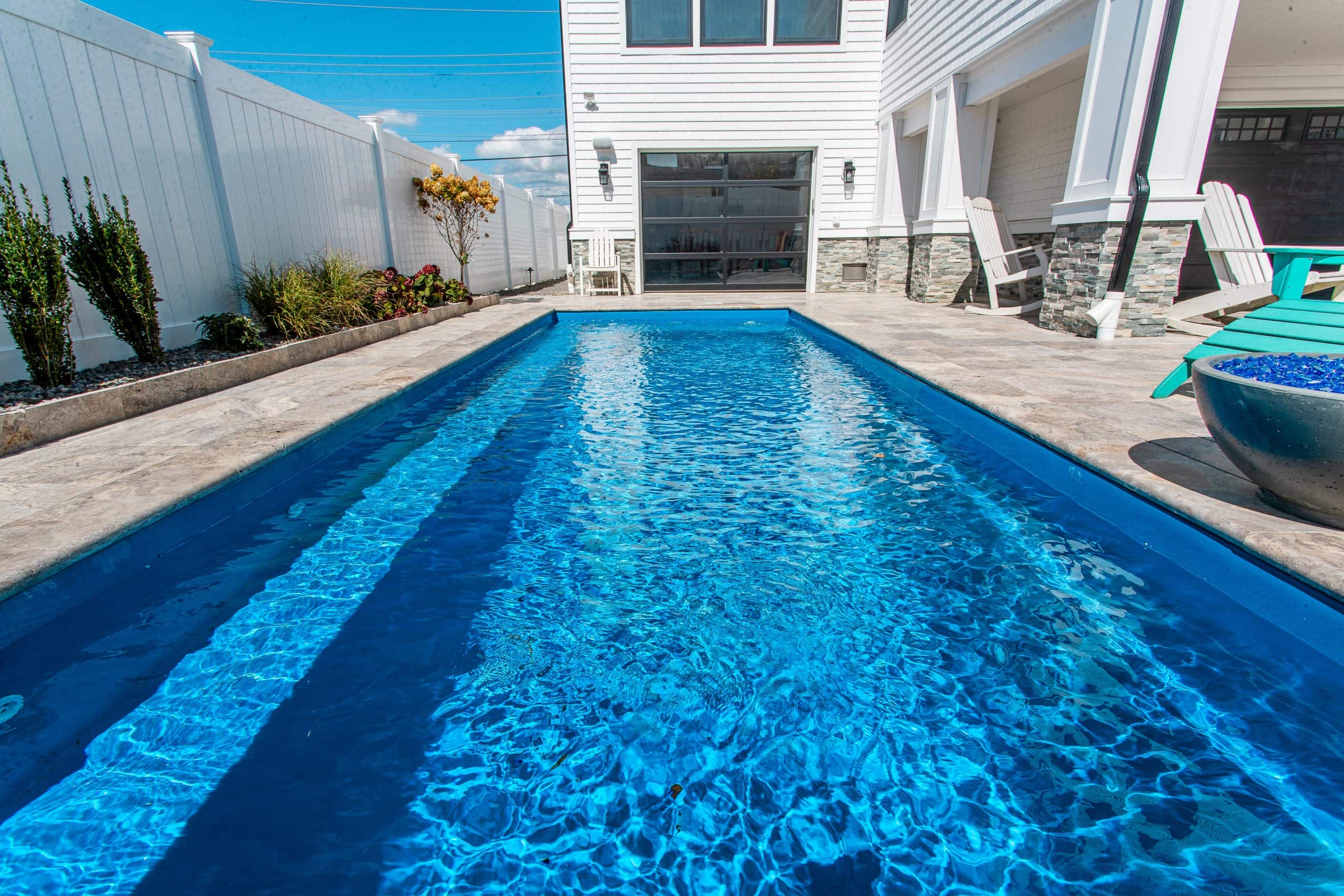 10x26-lap-fiberglass-pool-Rindge-xl-fiberglass-pool-install-6 - MGK Pools Inc Swimmer fiberglass pool by MGK Pools - real installation photo, installed complete by MGK Pools