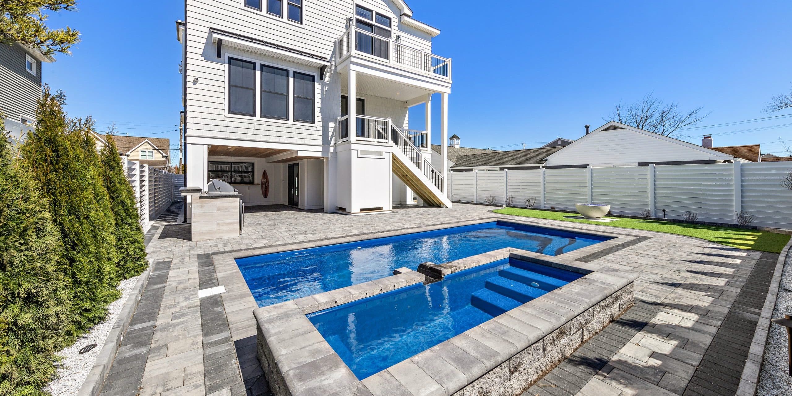 12x26-fiberglass-pool-empire-fiberglass-pool-install-1 - MGK Pools Inc Empire fiberglass pool by Glimmerglass - real installation photo, installed complete by MGK Pools