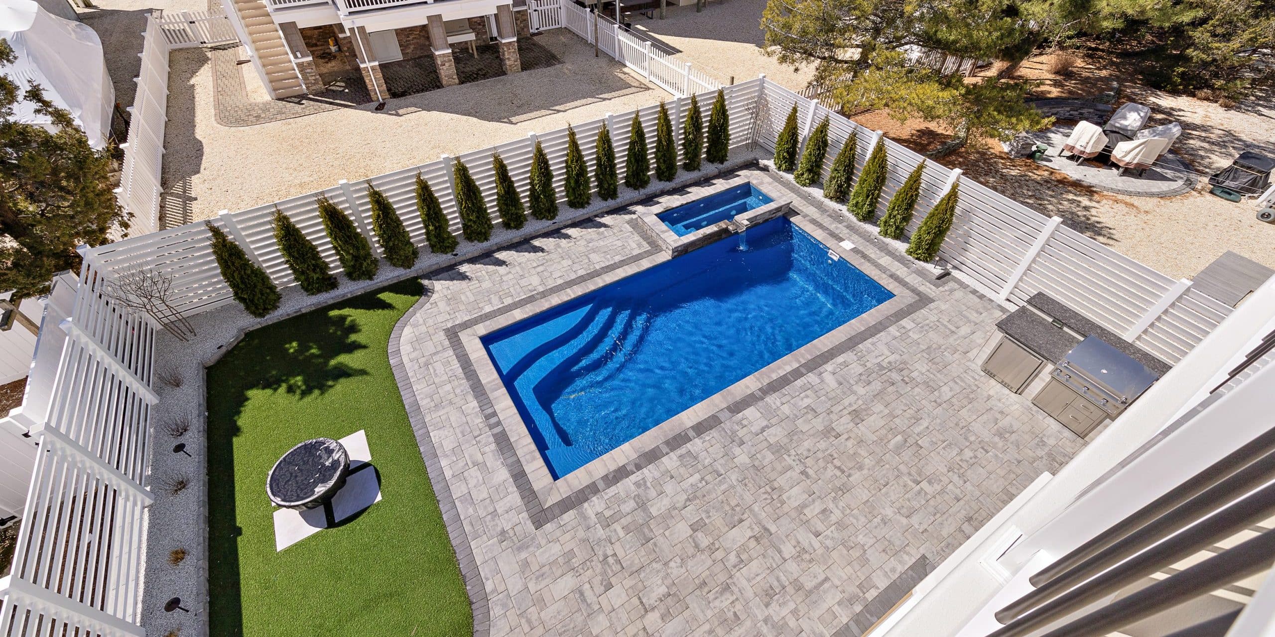 12x26-fiberglass-pool-empire-fiberglass-pool-install-2 - MGK Pools Inc Empire fiberglass pool by Glimmerglass - real installation photo, installed complete by MGK Pools