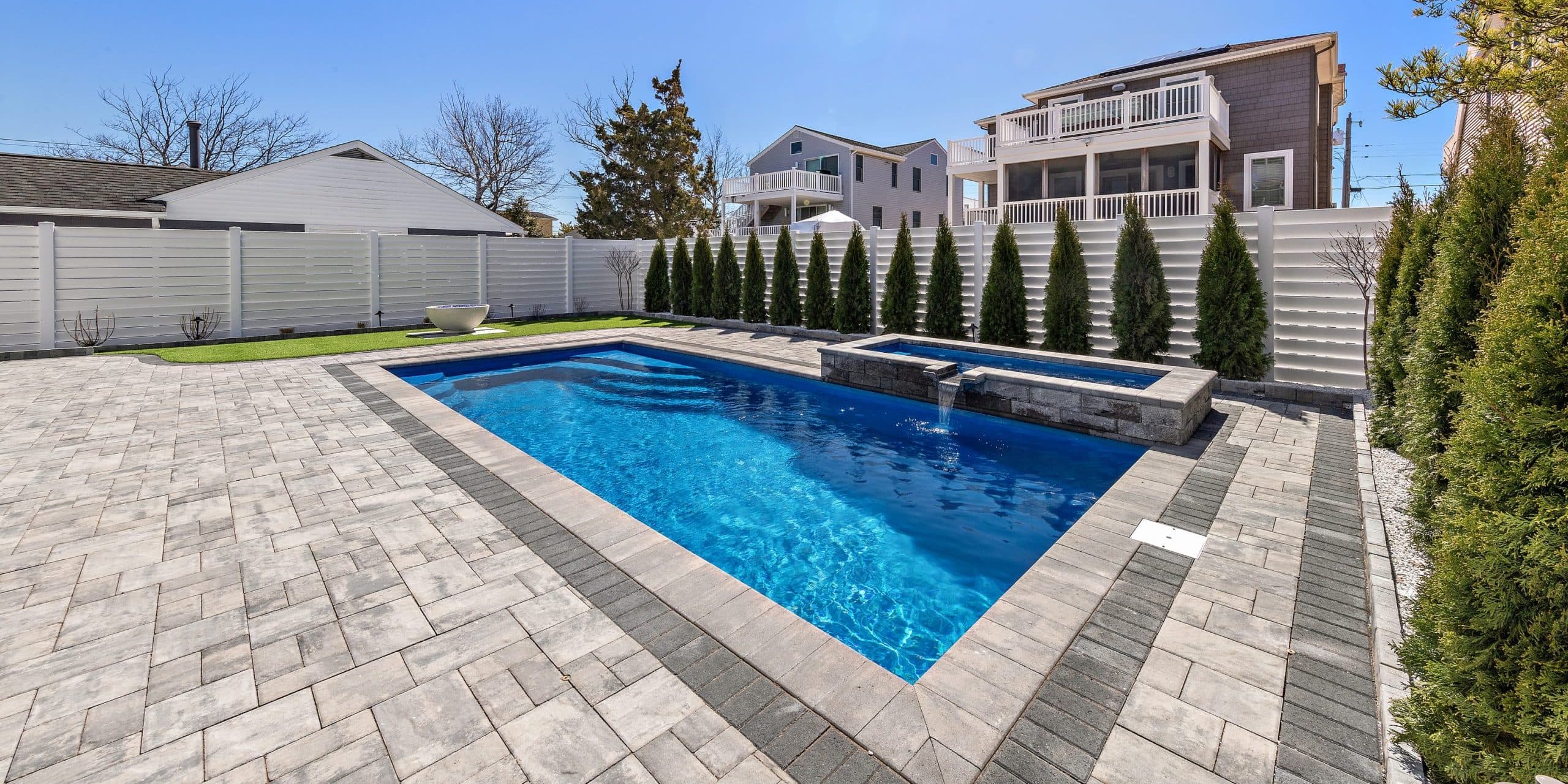 12x26-fiberglass-pool-empire-fiberglass-pool-install-3 - MGK Pools Inc Empire fiberglass pool by Glimmerglass - real installation photo, installed complete by MGK Pools