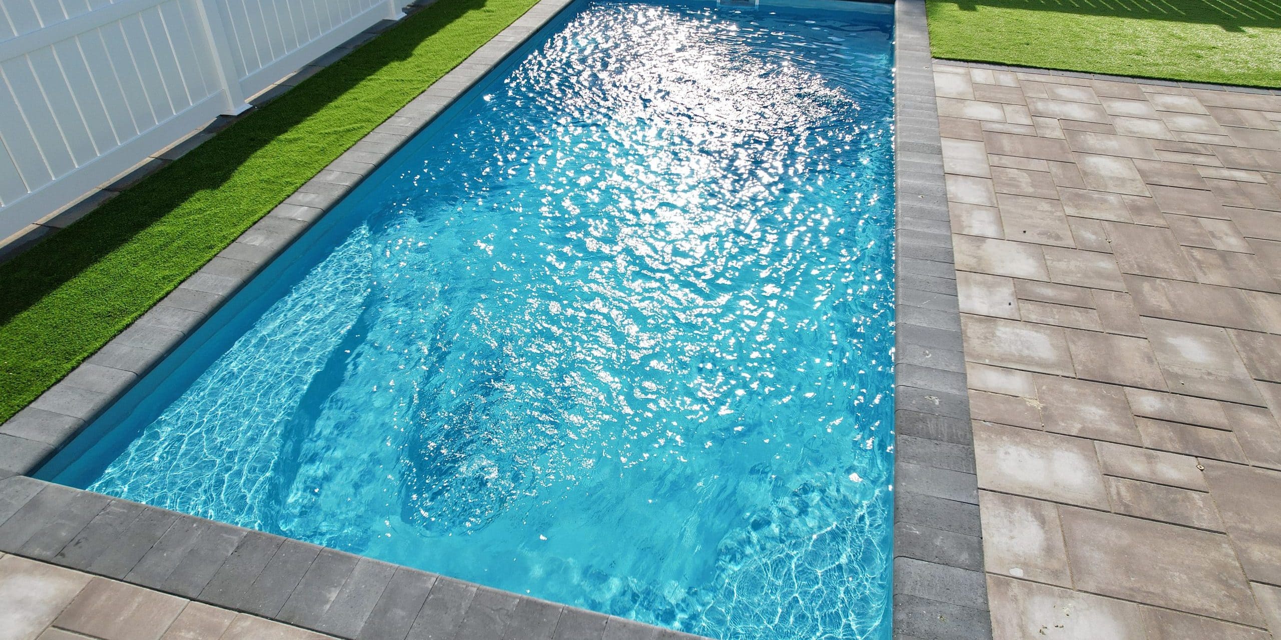 12x26-fiberglass-pool-empire-fiberglass-pool-install-5 - MGK Pools Inc Empire fiberglass pool by Glimmerglass - real installation photo, installed complete by MGK Pools