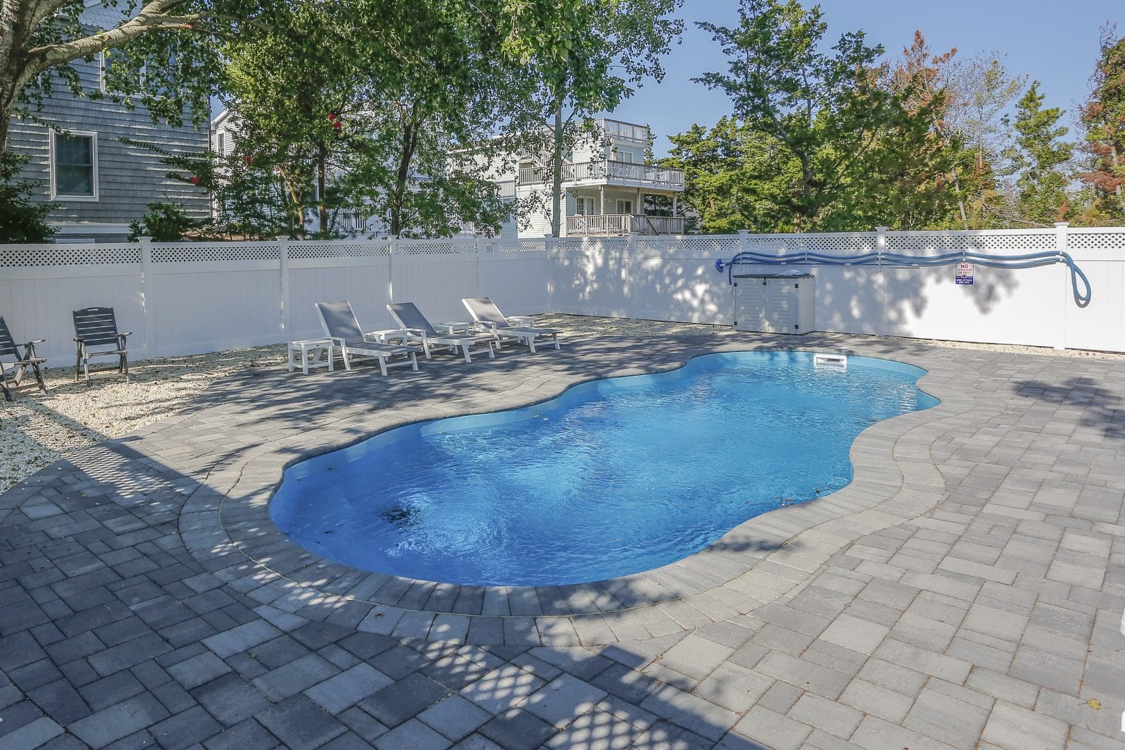 13x33-fiberglass-pool-oasis-fiberglass-pool-install-2 - MGK Pools Inc Oasis fiberglass pool by Glimmerglass - real installation photo, installed complete by MGK Pools