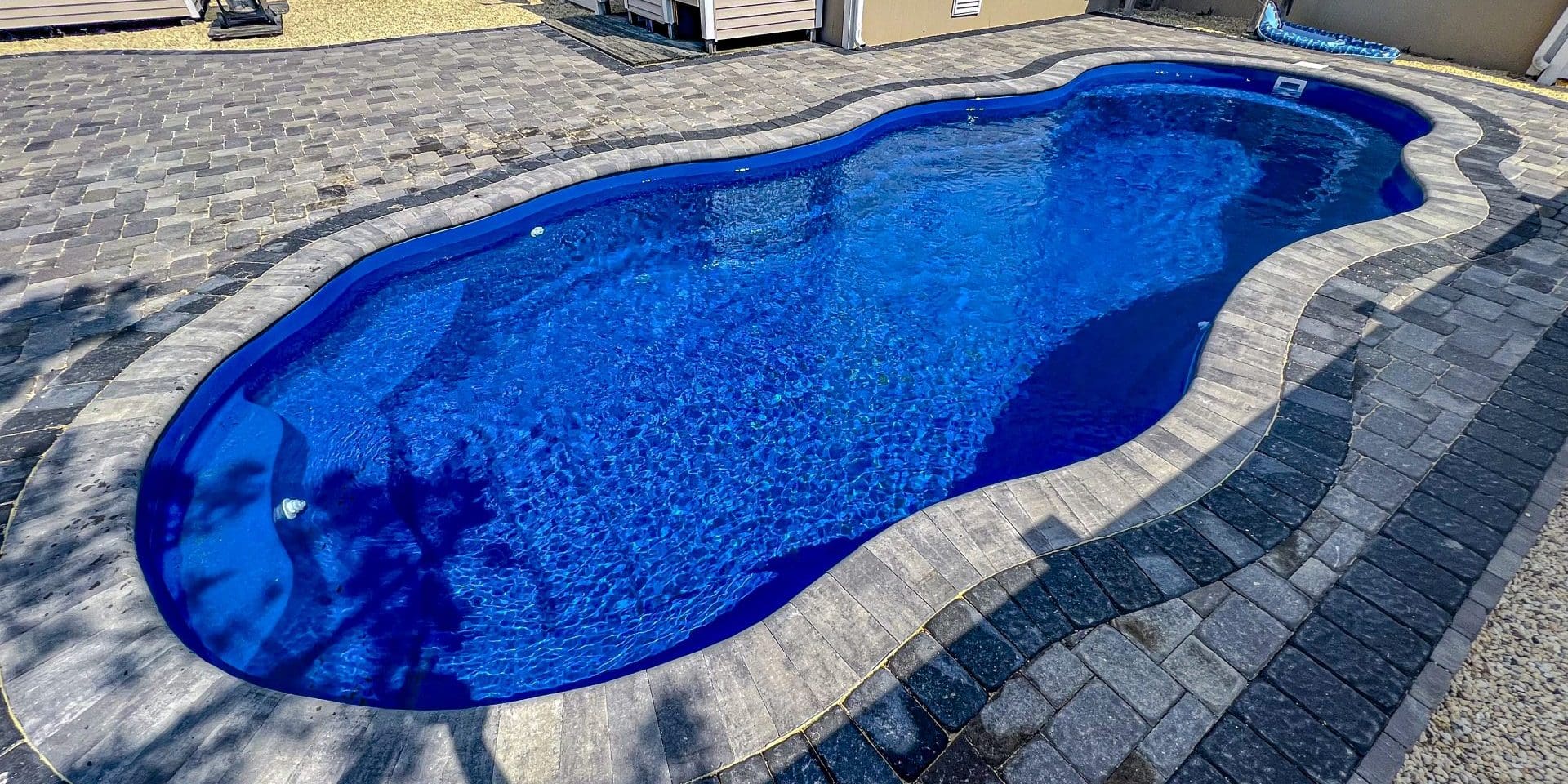 13x33-fiberglass-pool-oasis-fiberglass-pool-install-6 - MGK Pools Inc Oasis fiberglass pool by Glimmerglass - real installation photo, installed complete by MGK Pools