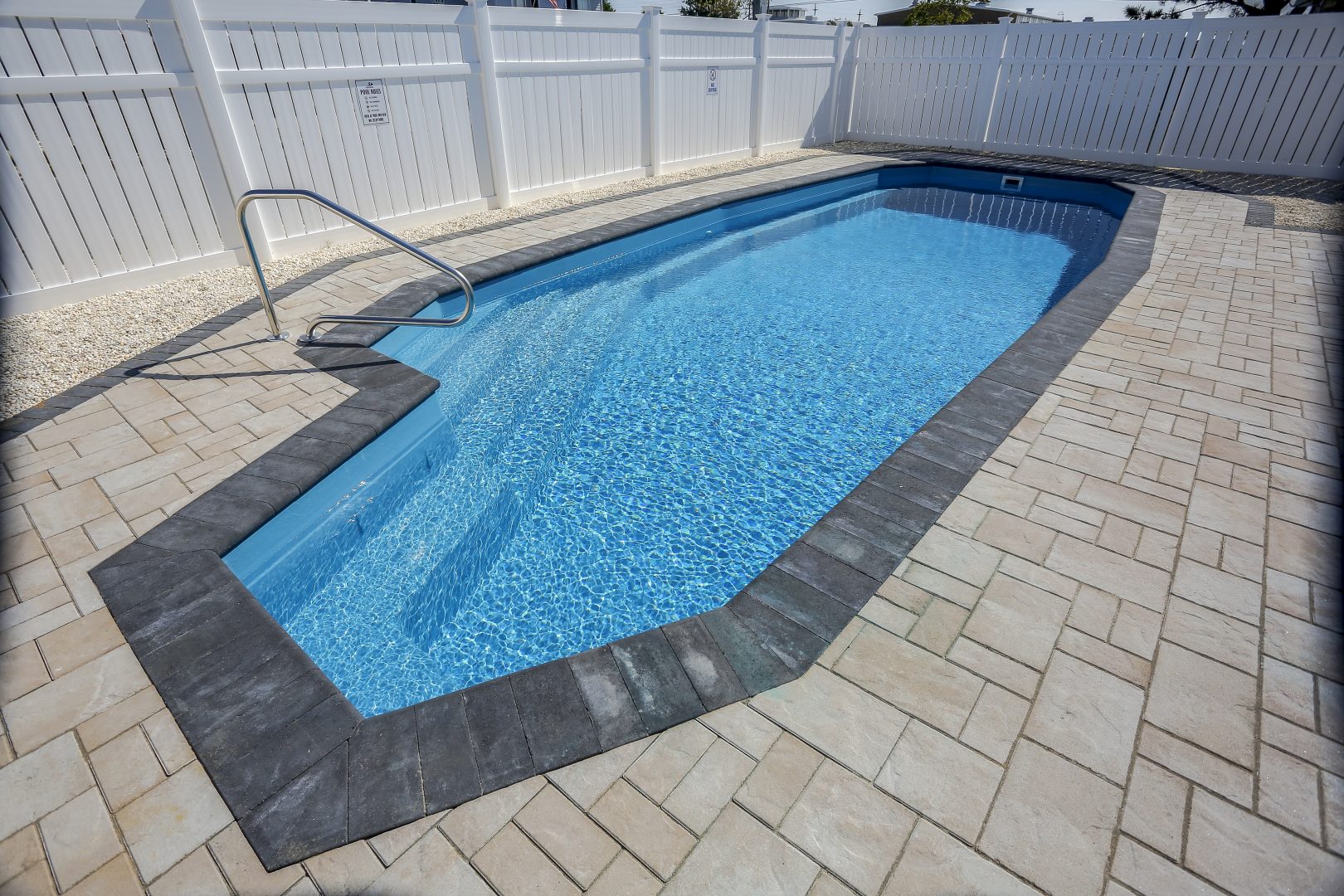 13x35-fiberglass-pool-azores-fiberglass-pool-install-3 - MGK Pools Inc Azores fiberglass pool by Glimmerglass - real installation photo, installed complete by MGK Pools