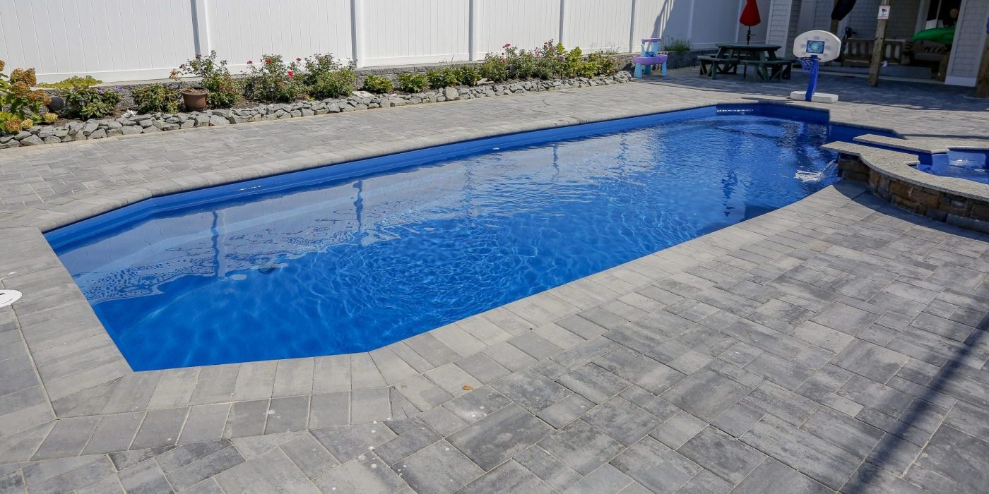13x35-fiberglass-pool-azores-fiberglass-pool-install-5 - MGK Pools Inc Azores fiberglass pool by Glimmerglass - real installation photo, installed complete by MGK Pools