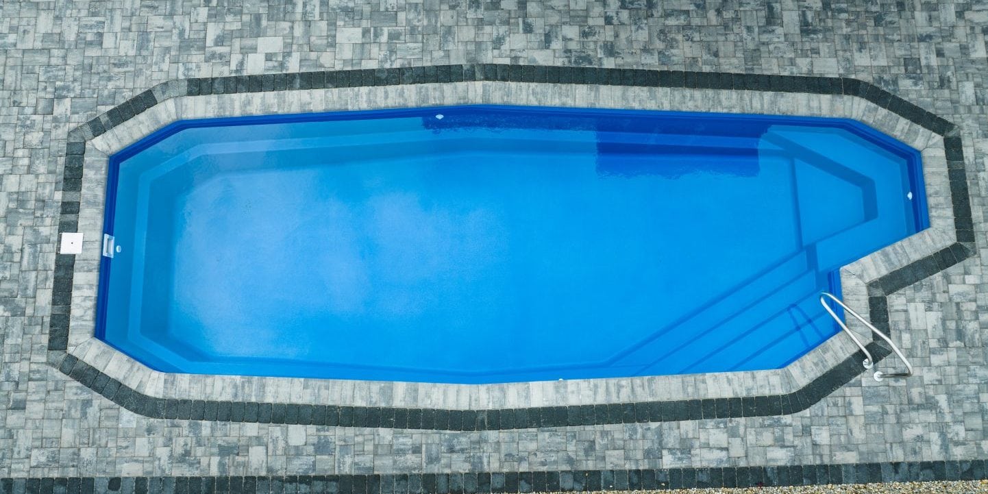 13x35-fiberglass-pool-azores-fiberglass-pool-install-6 - MGK Pools Inc Azores fiberglass pool by Glimmerglass - real installation photo, installed complete by MGK Pools
