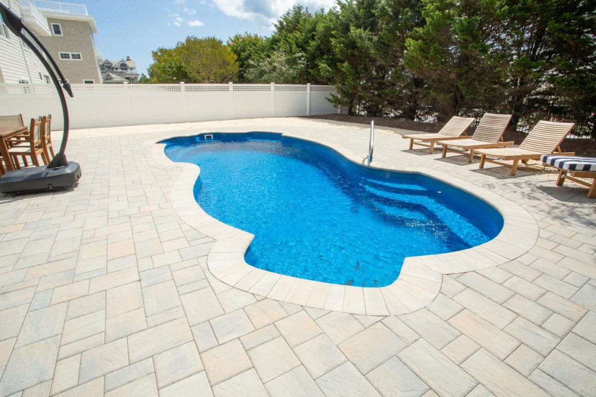 15x32-fiberglass-pool-nassau-fiberglass-pool-install-2 - MGK Pools Inc Nassau fiberglass pool by Glimmerglass - real installation photo, installed complete by MGK Pools