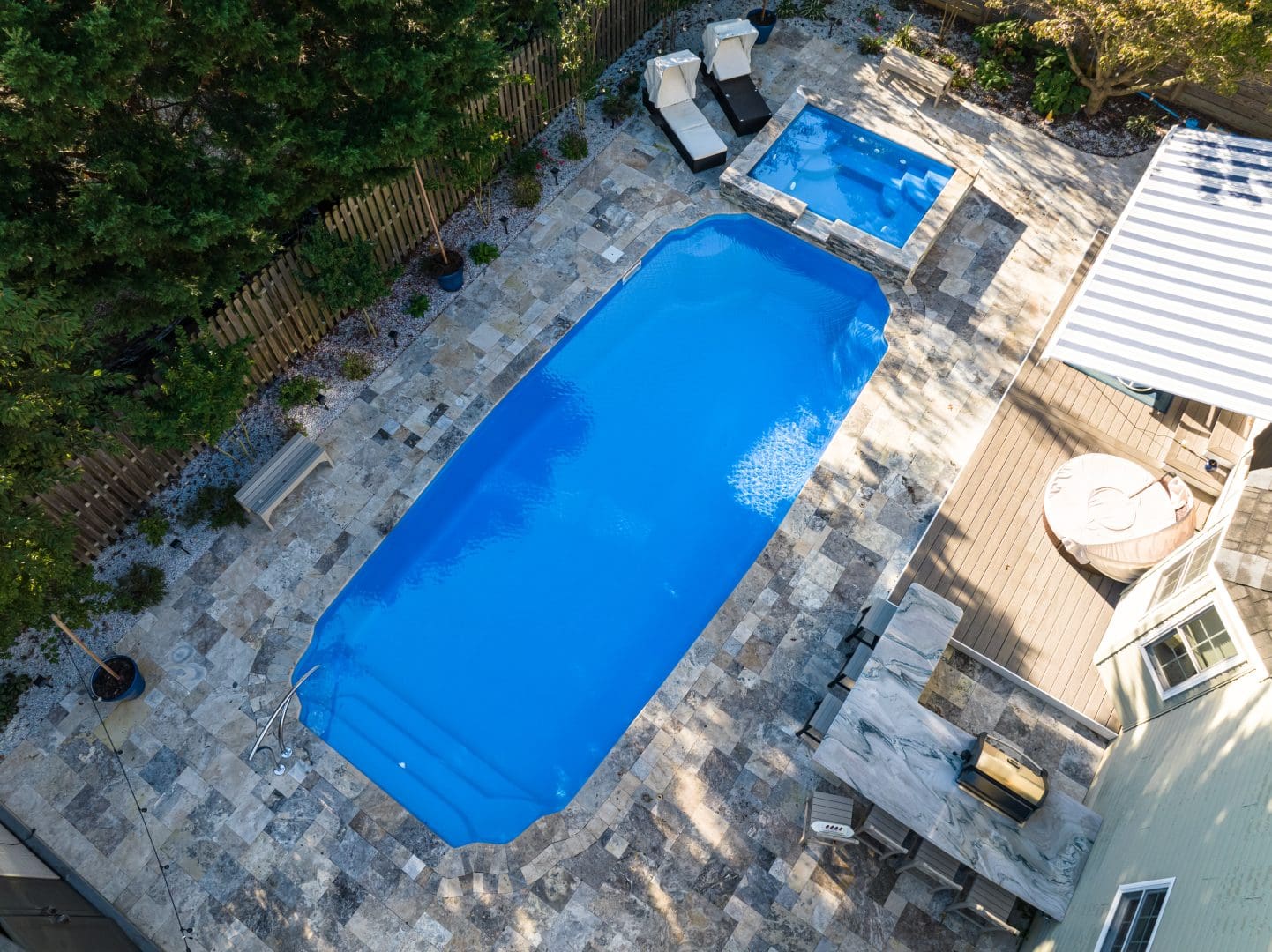 15x34-fiberglass-pool-maui-fiberglass-pool-install-1 - MGK Pools Inc Maui fiberglass pool by Glimmerglass - real installation photo, installed complete by MGK Pools