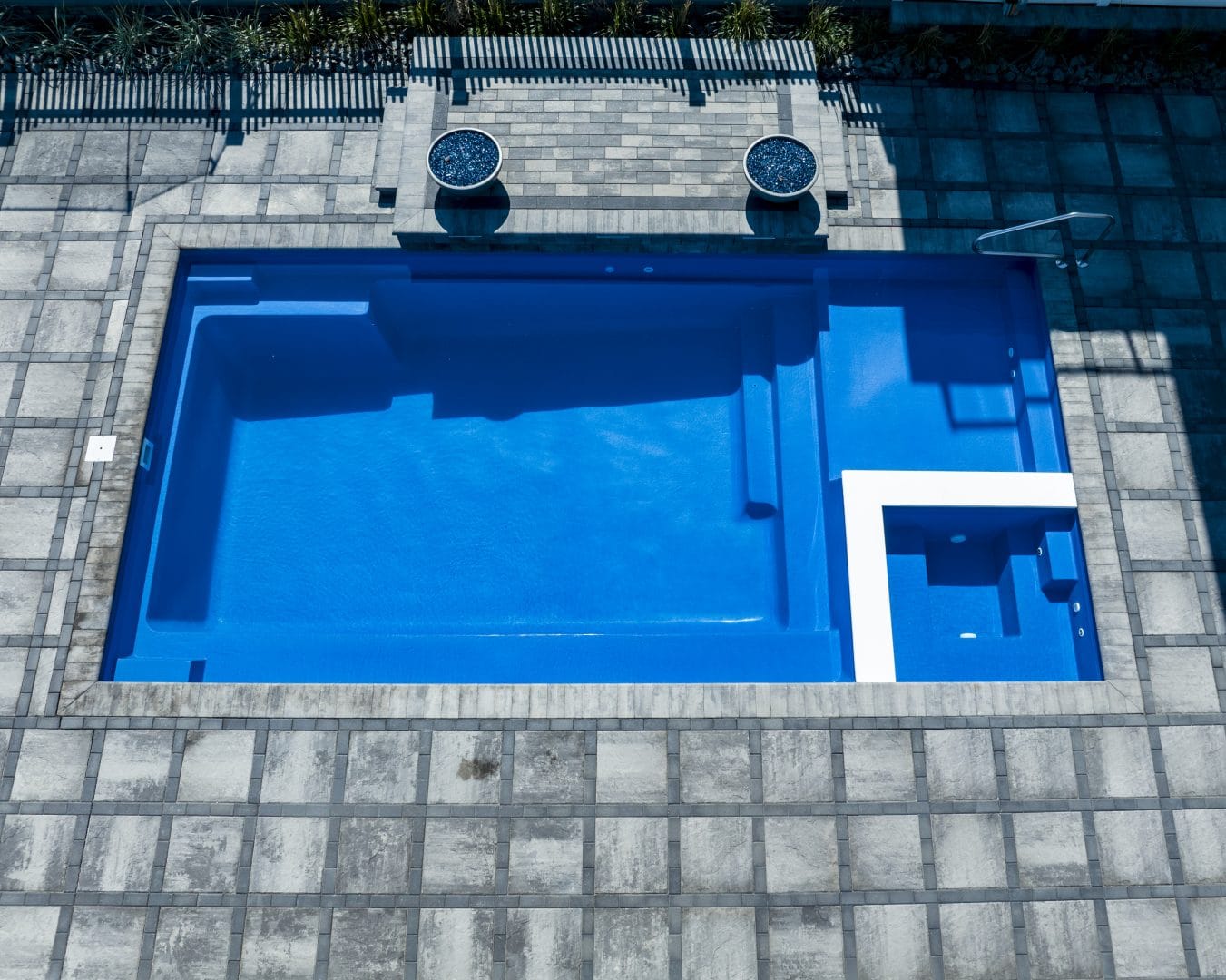 extreme-30-fiberglass-pool-installed-1 - MGK Pools Inc Extreme 30 fiberglass pool by Glimmerglass - real installation photo, installed complete by MGK Pools