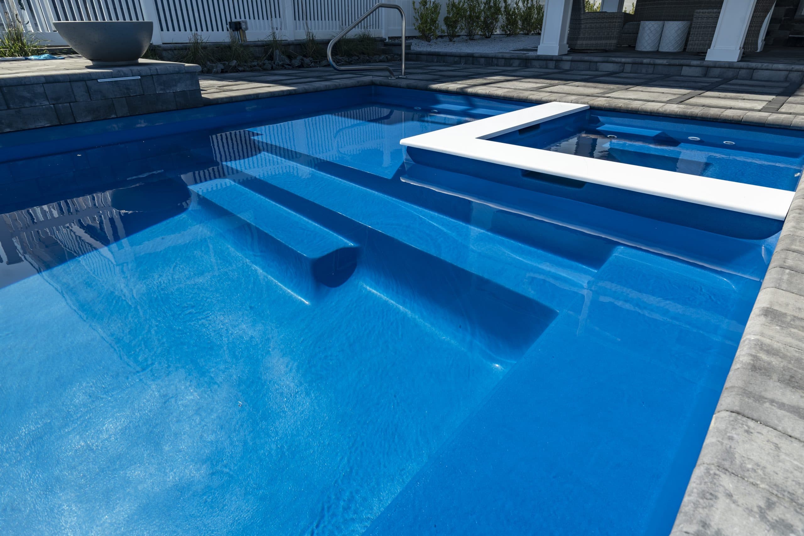 extreme-30-fiberglass-pool-installed-3 - MGK Pools Inc Extreme 30 fiberglass pool by Glimmerglass - real installation photo, installed complete by MGK Pools