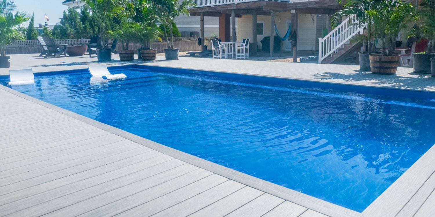 ponce-xl-fiberglass-pool-installed-3 - MGK Pools Inc Ponce XL fiberglass pool by Glimmerglass - real installation photo, installed complete by MGK Pools