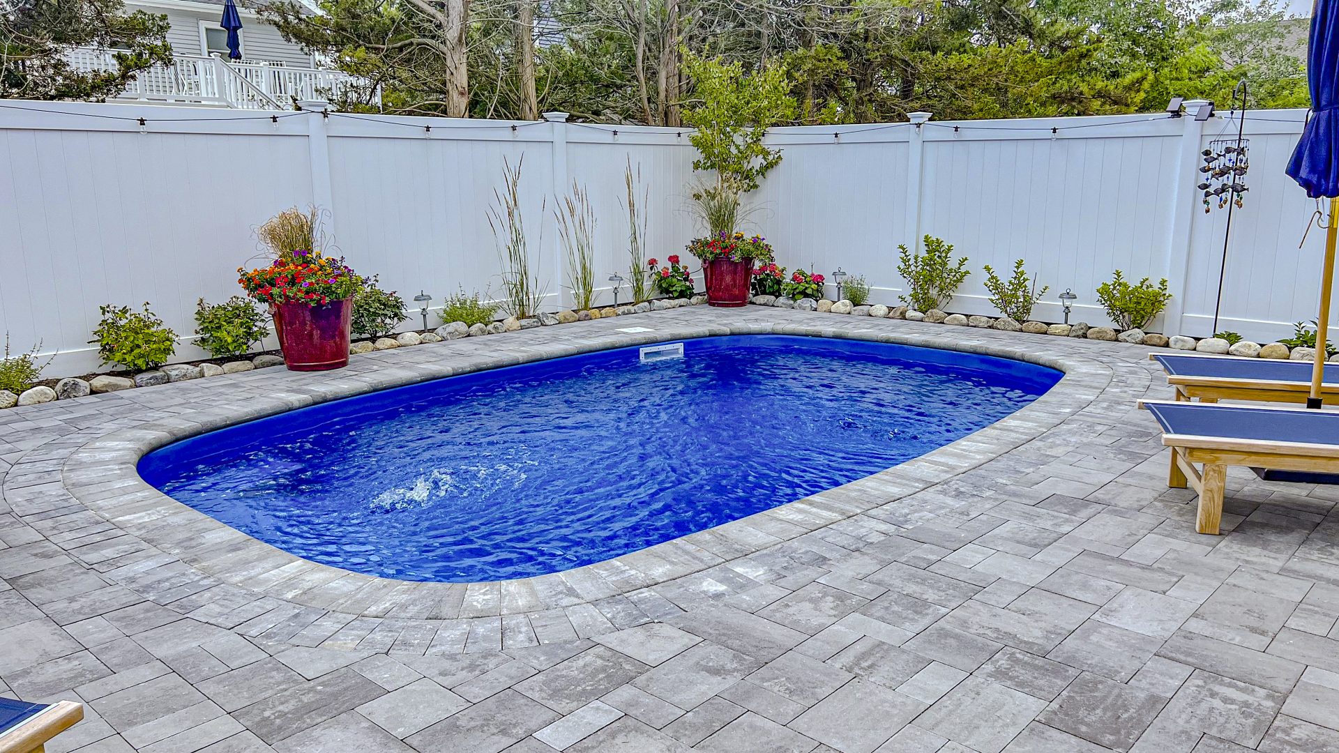 sundial-fiberglass-pool-installed-1 - MGK Pools Inc Sundial fiberglass pool by Glimmerglass - real installation photo, installed complete by MGK Pools