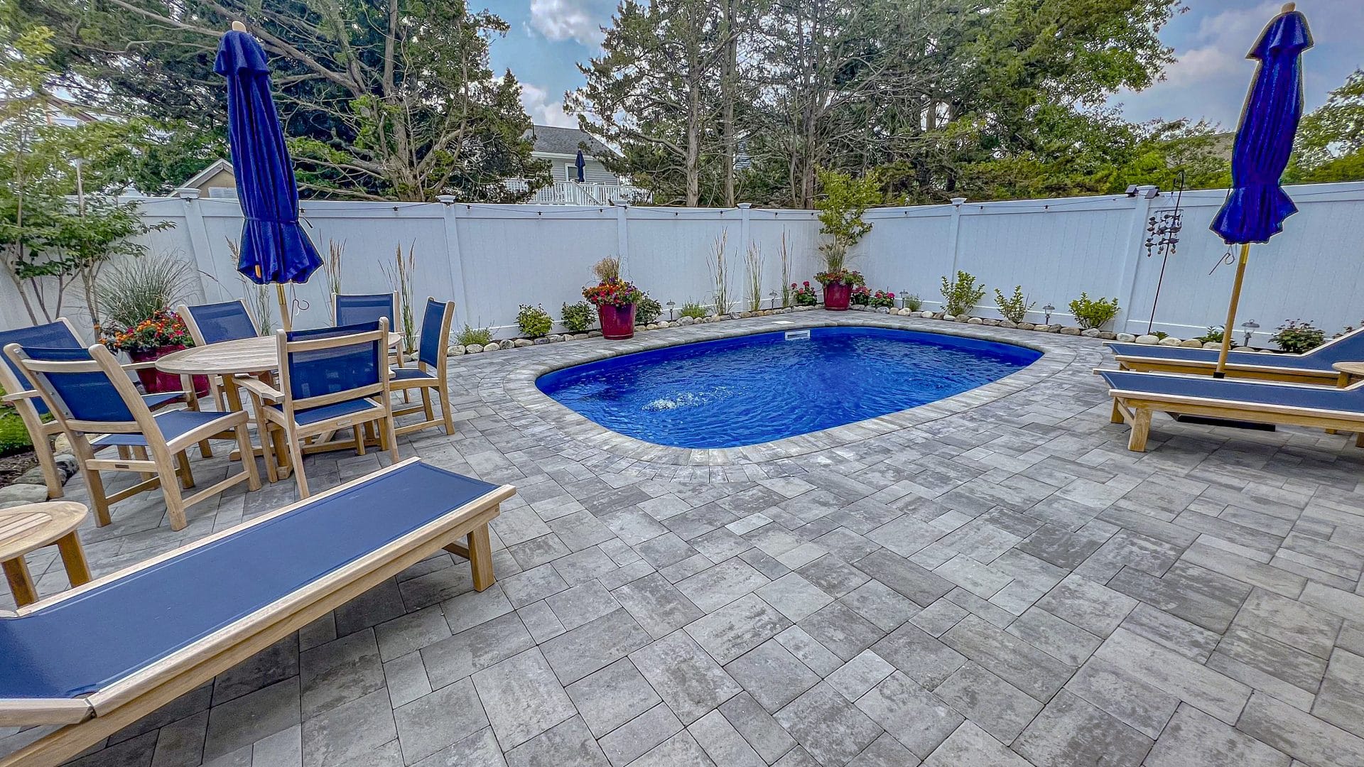 sundial-fiberglass-pool-installed-2 - MGK Pools Inc Sundial fiberglass pool by Glimmerglass - real installation photo, installed complete by MGK Pools