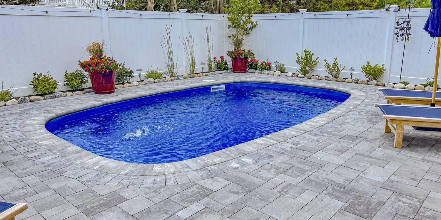 sundial-fiberglass-pool-installed-5 - MGK Pools Inc Sundial fiberglass pool by Glimmerglass - real installation photo, installed complete by MGK Pools