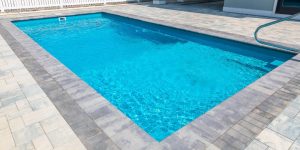 Tan Town fiberglass pool by MGK Pools - real installation photo, installed complete by MGK Pools